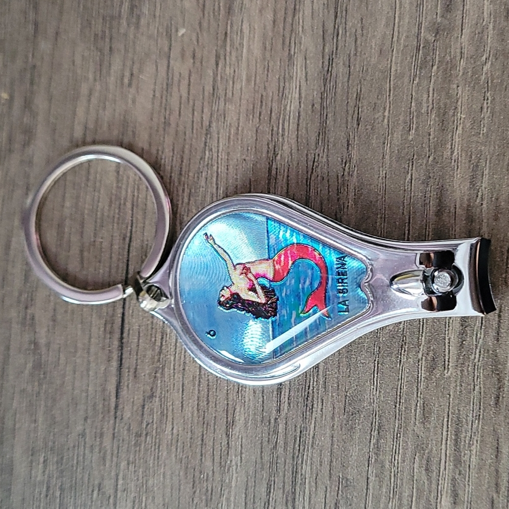 Nail clipper/ Bottle Opener